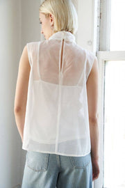 A solid organza top